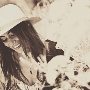 Picture of Manchester musician Zoe Kyoti wearing a hat and smiling. Copyright Zoe Kyoti - Official Site